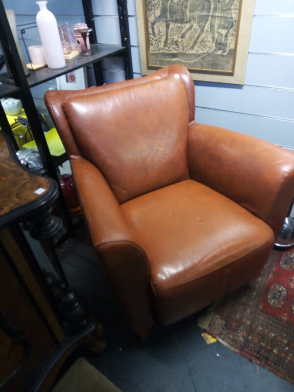 Luxe lederen cognac kleurige fauteuil afbeelding 2