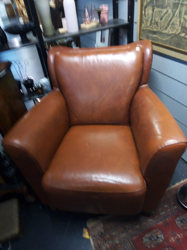 Luxe lederen cognac kleurige fauteuil afbeelding 4